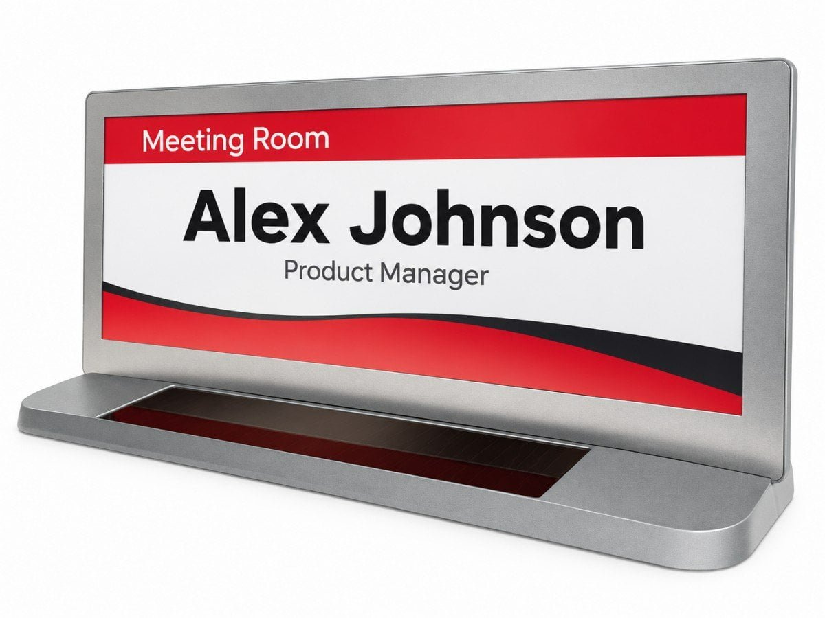 Illustrative E-Ink desk nameplate in a meeting space